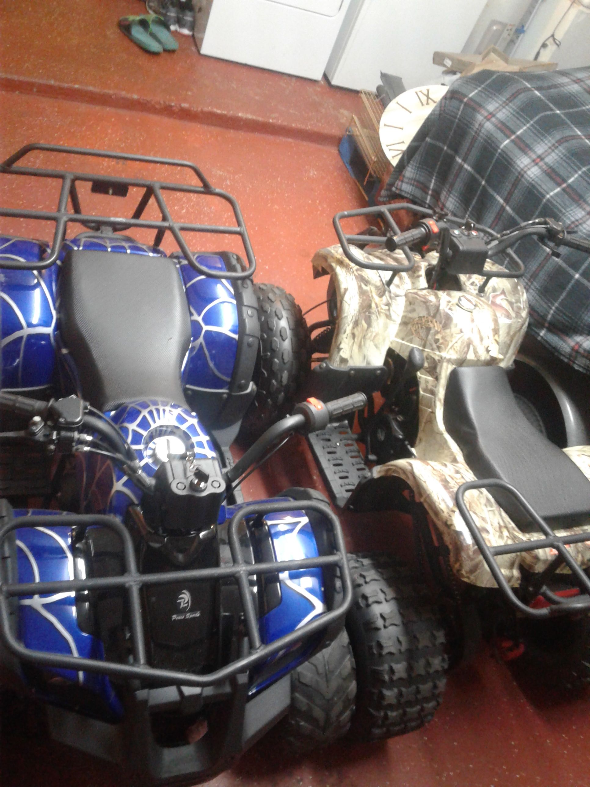 2 four wheelers atvs
