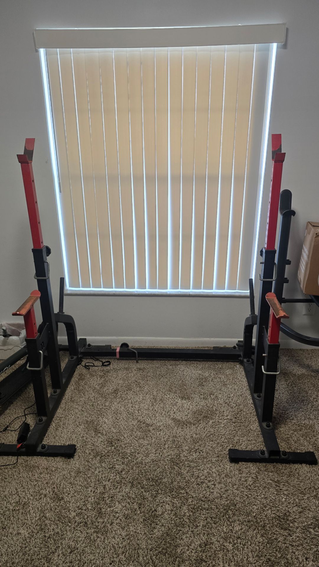 Adjustable squat rack