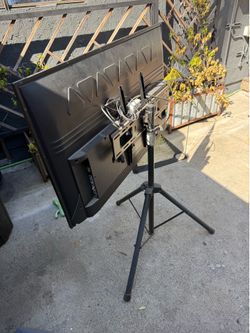 Tv with tv stand with outdoor cover