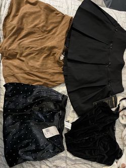 Brand new and only used once shirts and a top