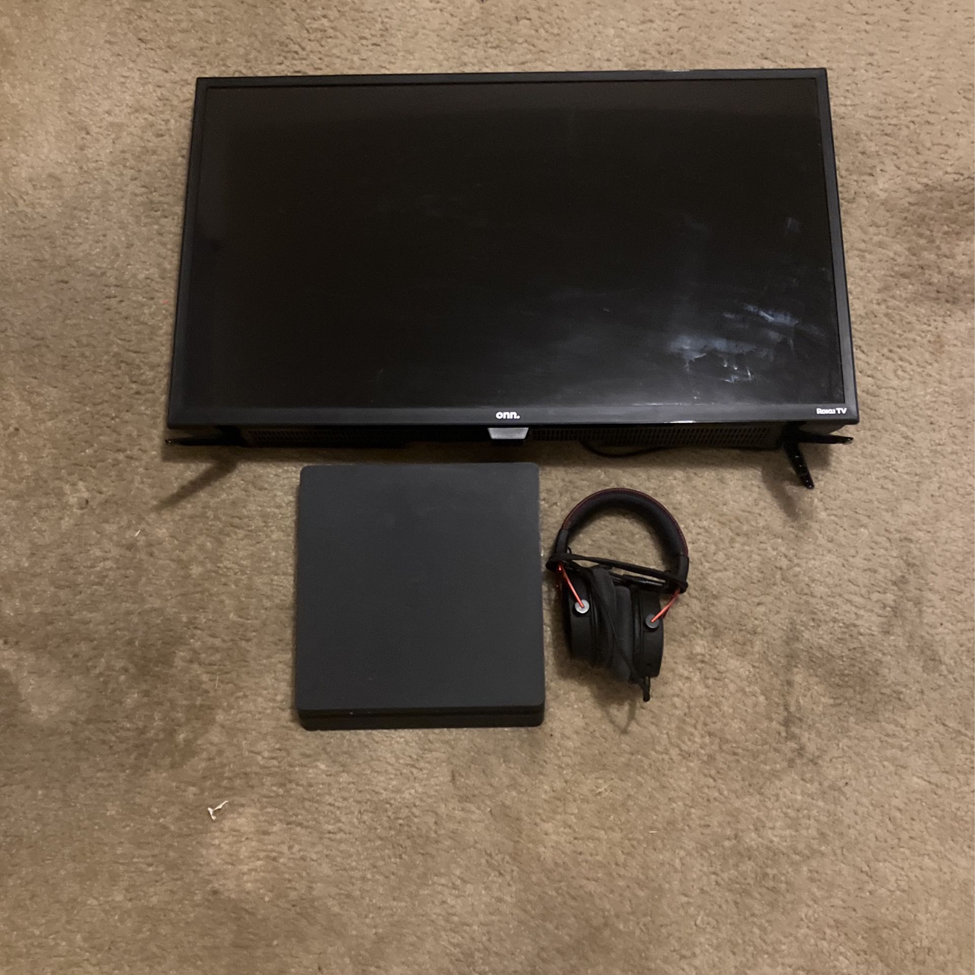 Slim Playstation 4 (1Tb) Roku tv(35in) Headphones ( Brand new)