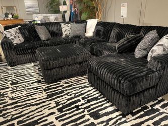 Large 3 piece Sectional features luxuriously soft jumbo corduroy fabric