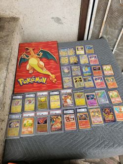Big Collection of Charizard & Pikachu Cards CGC PSA with single Raw & Picture Frame. Just Charizard celebration is $250! Alole. All Pokémon $2000! Fir
