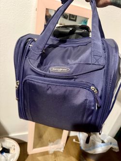 Samsonite Upright Wheeled Underseater Carry-On Travel Bag.
