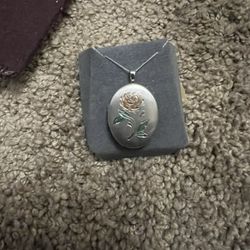 Oval silver locket pendant with chain  