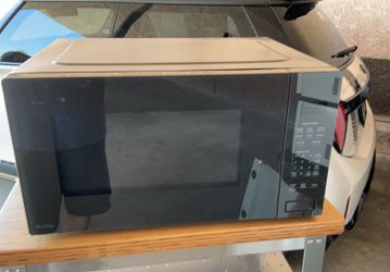 NEW”—GE PROFILE MICROWAVE