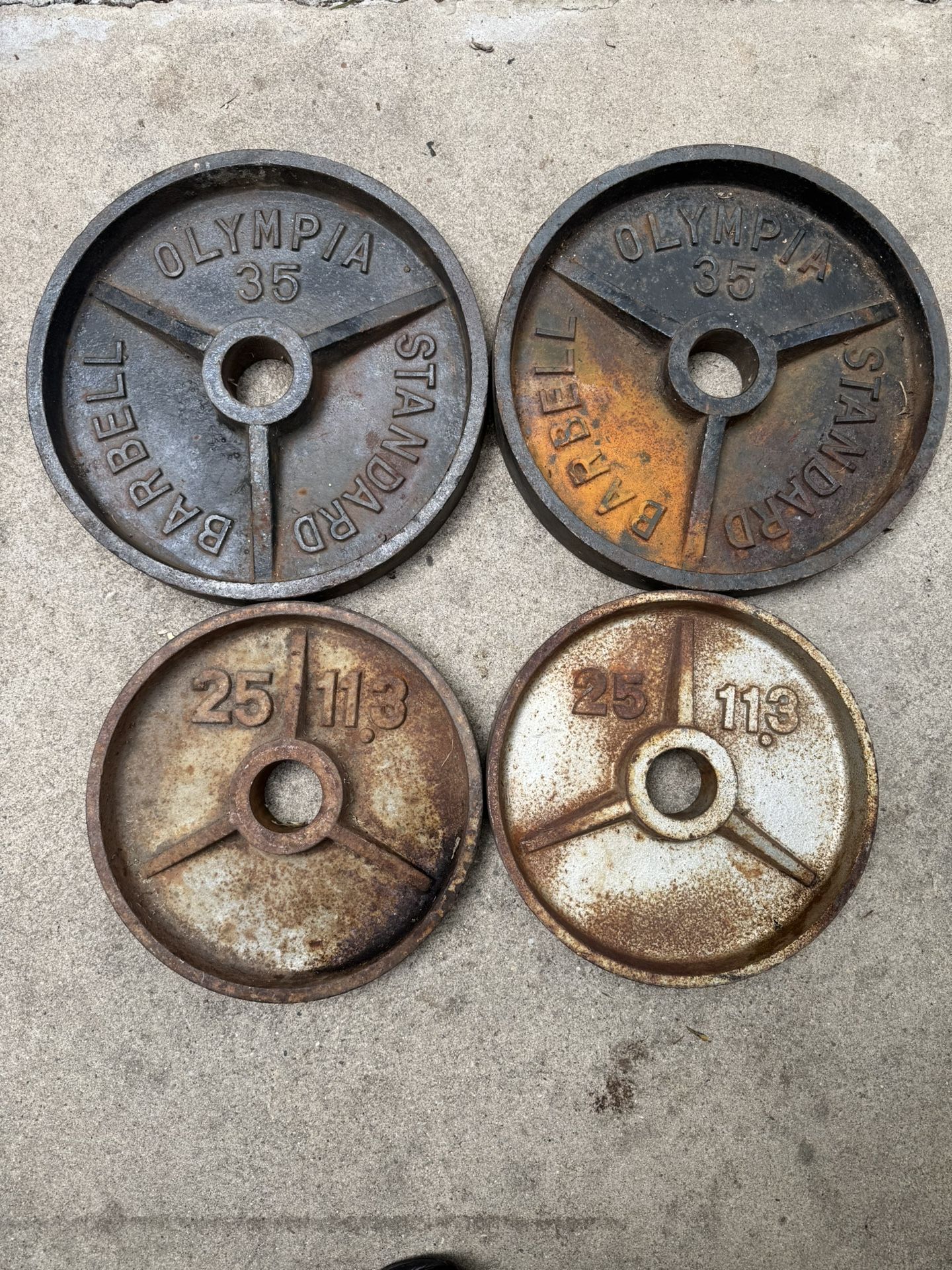 Olympic Weights 35s And 25s In Solid Condition Workout Weights