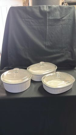 Corning ware set of three with glass lids oven safe
