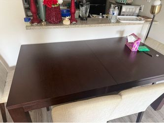 Table includes 4 chairs