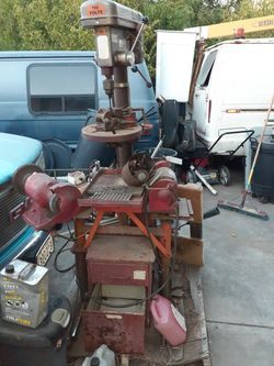 6 feet high used drill press grinder cabinet combinations in good working condition it also includes some drill bits