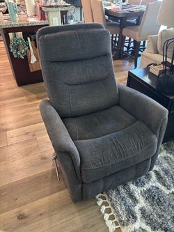 Grey swivel recliner