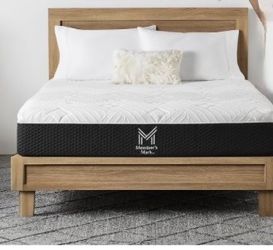 Queen sized bed complete with frame, bed and bedding