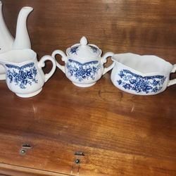 Creamer , Sugar And Another Dish