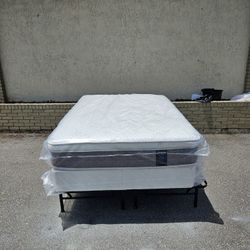 Brand new full-size plush Pillow top mattress and box spring in Plastics 