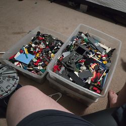 Three bins of assorted legos