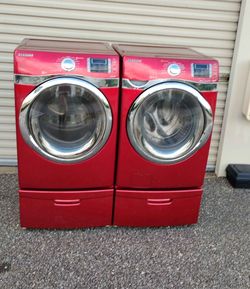 Samsung Red Front Load Washer and Dryer Set with Steam and Pedestals