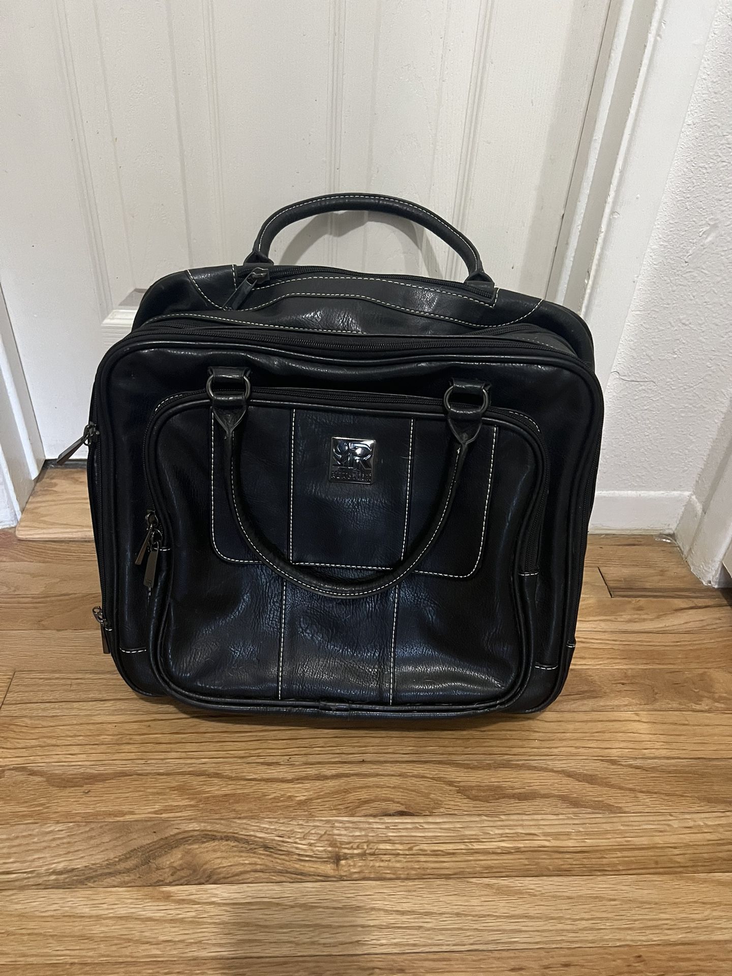 Kenneth Cole Reaction Black Leather Rolling Bag