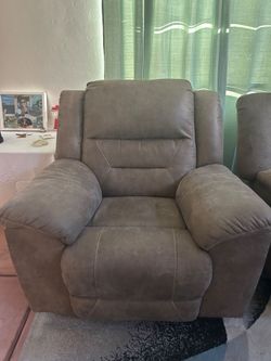 Ashley Stoneland power rocker recliner
