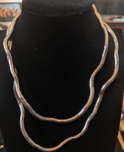 $10. Gray bendable necklace or bracelet. 35 inches long.