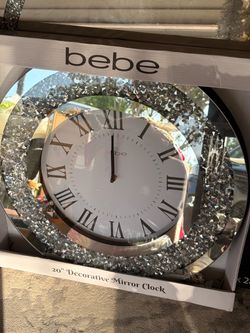 “Bebe” clock silver color