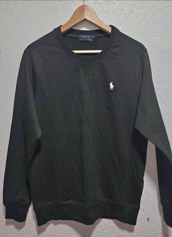 Polo Ralph Lauren men's crewneck fleece sweatshirt featuring an embroidered logo on the chest.Brand: Polo Ralph LaurenMaterial: Cotton blendFeatures: 