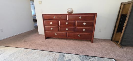 10-drawer cherry wood dresser