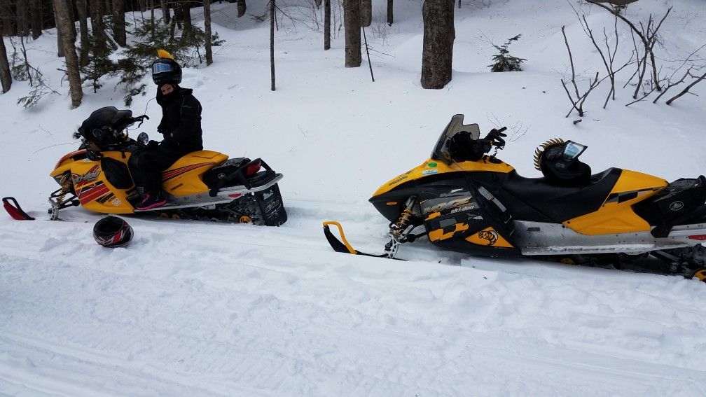 2 Skidoo Snowmobiles with an enclosed trailer up for sale