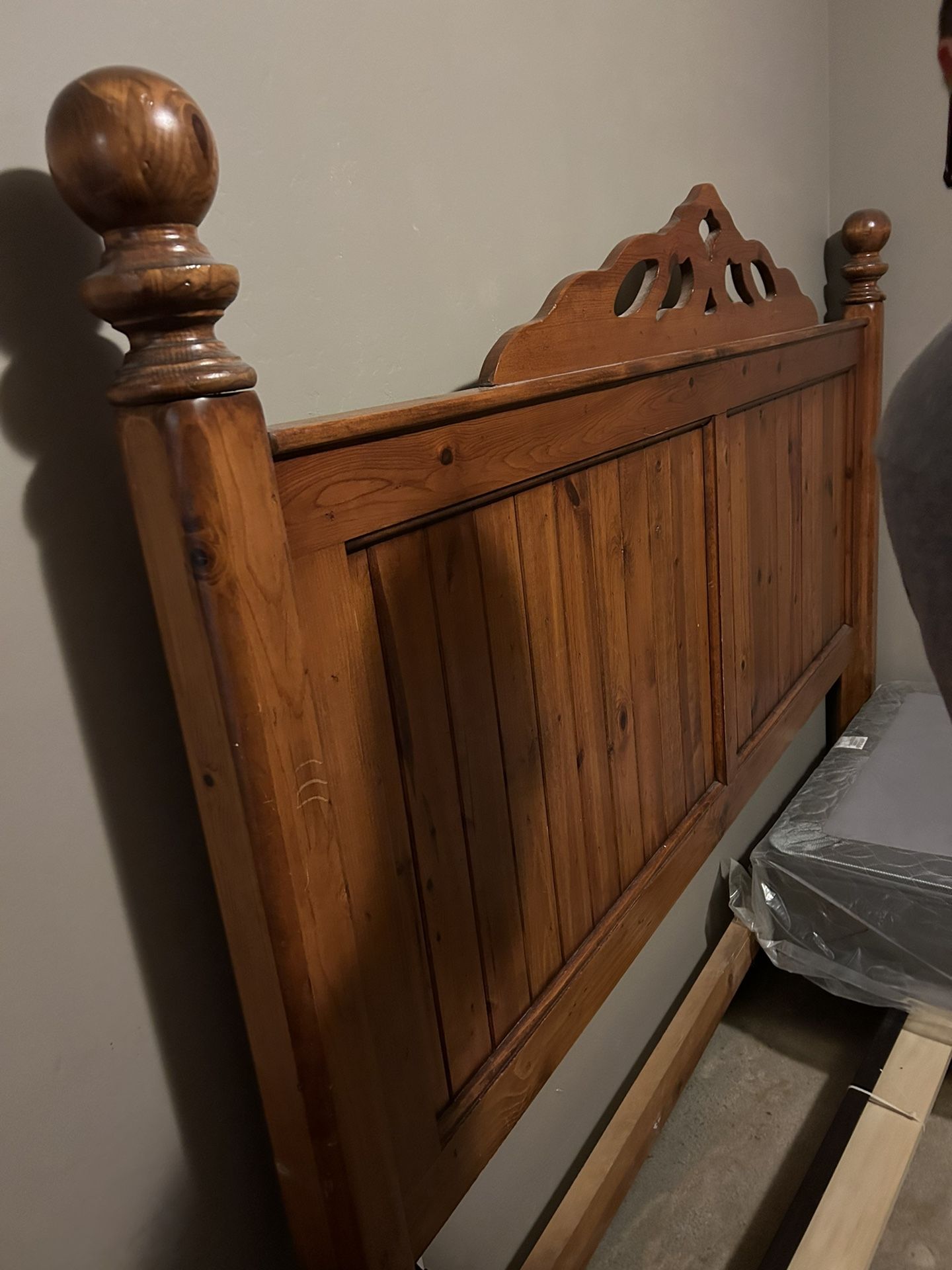 Heavy Wooden California King Bed With Tall Dresser And Matching Night Stand With 2 Bottom Half Mattress’s Still Wrapped In Plastic