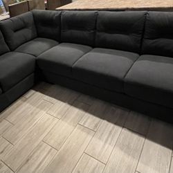 Living Spaces Sectional Sofa. Purchased seven months ago.
