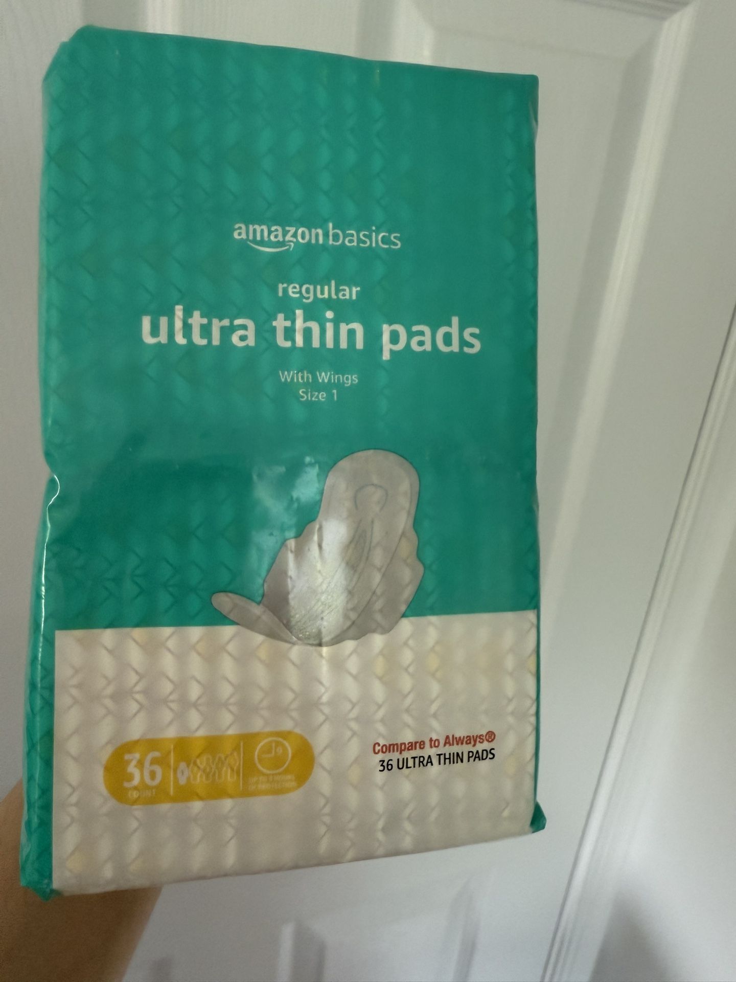 Amazon Basics Regular Absorbency Pads for Women, Ultra Thin with Flexi-Wings, Unscented