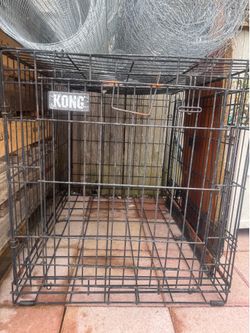 Free large dog cage.