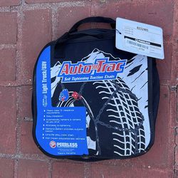Tire chains. Barely used, self tightening