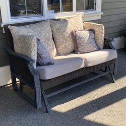 Out door glider loveseat with cushions