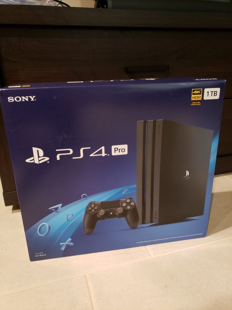 New Playstation 4 pro 1TB 4K HDR New unopened seal price is firm