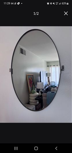 Oval Wall Mirror with Black Metal Frame