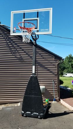 Spalding 54 Inch NBA Glass Backboard Portable Basketball System