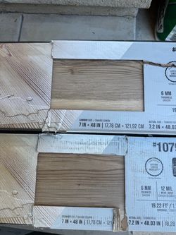 Stainmaster Mecklenberg Pine 12-mil x 7-in W x 48-in L Waterproof Click Lock Luxury Vinyl Plank Flooring ( 19.22-sq ft Per Carton )