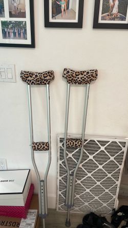 crutches with leopard cushion