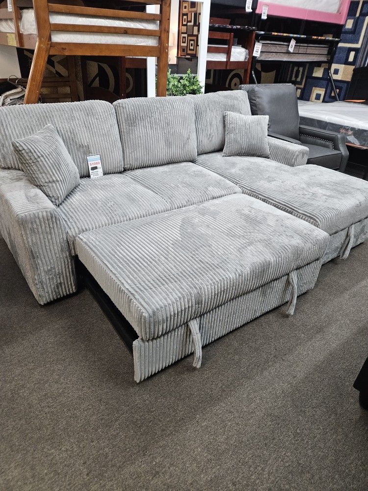 New sectional with pullobed and storage $899