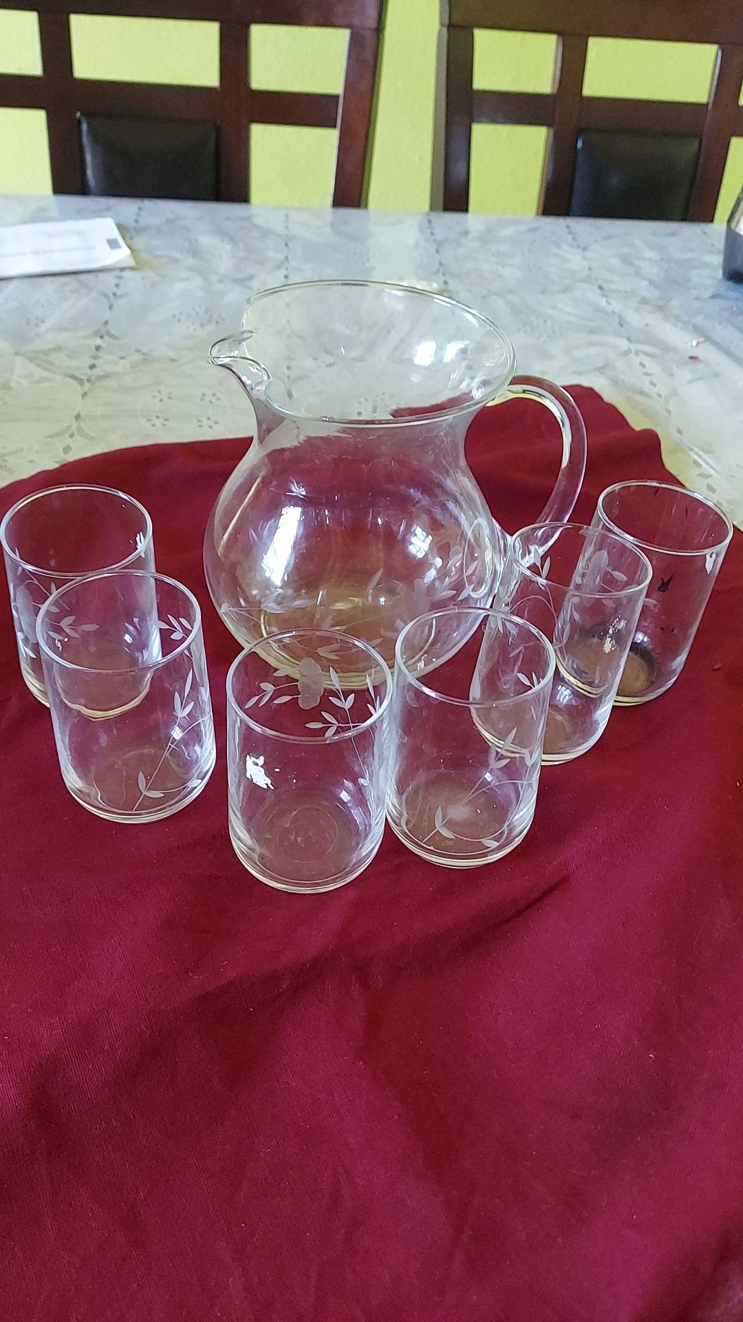 6 glass wine cups and one glass pitch