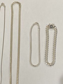 Two 925 silver chains and two 925 silver bracelets.