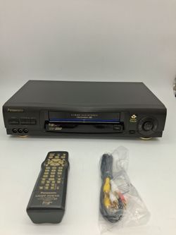 Panasonic, VCR with remote and cable.  Works fine.