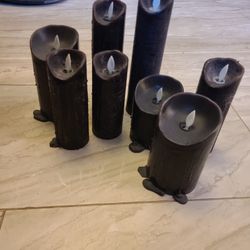 8 black battery operated flickering candles 