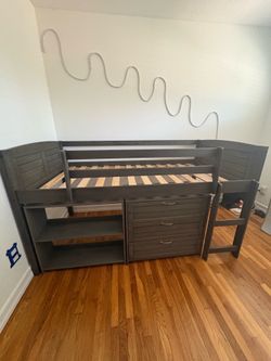 twin loft bed with dresser and bookshelf