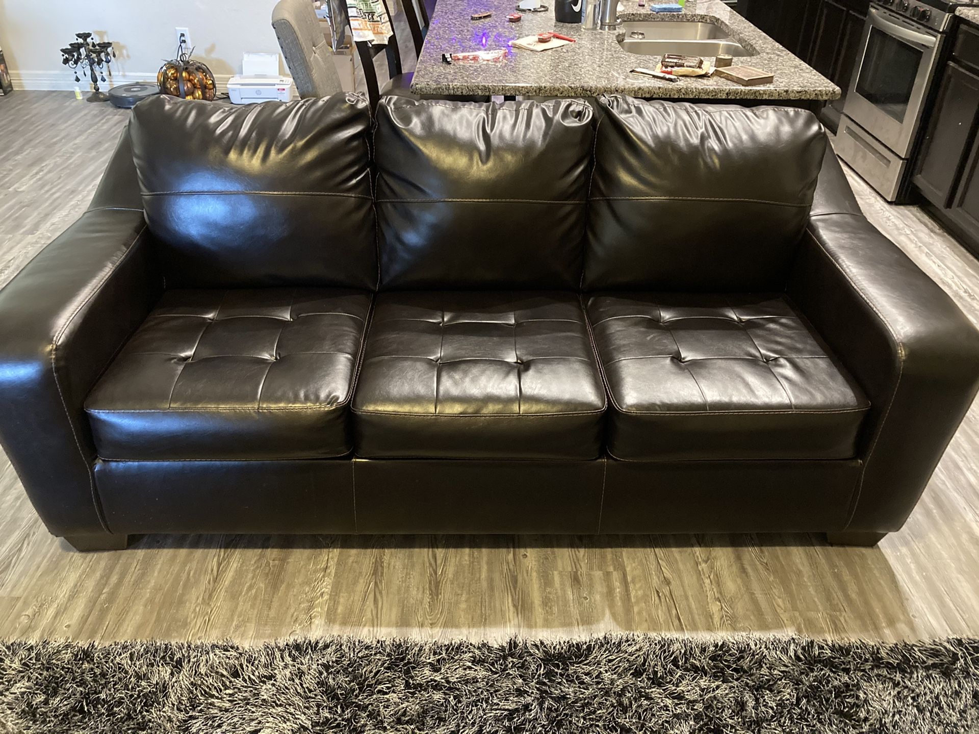 Faux leather couches