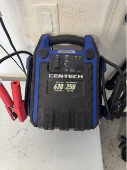 Battery jumper/air compressor