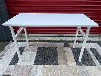 Table with foldable legs!! Dimensions: 47.5” x 23.5” x 29” Height