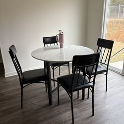 Marble small table with 4 chairs  6 months old