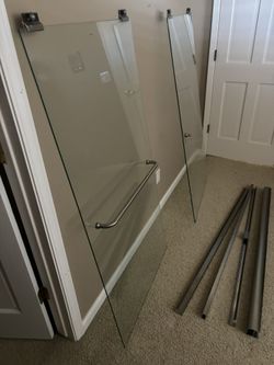 $375 *New* 30x58 1/2x1/4 PAIR OF GLASS SHOWER DOORS W/RAILS