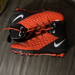 9.5 Men’s Orange & Black Nike Force Pro Cleats